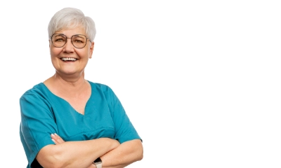 Arzthelferin in grüner Arbeitskleidung 